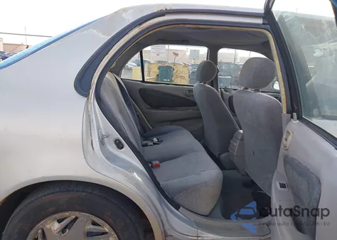 2001 Toyota Corolla Le z USA, uszkodzony, nr VIN 1NXBR12E21Z450378